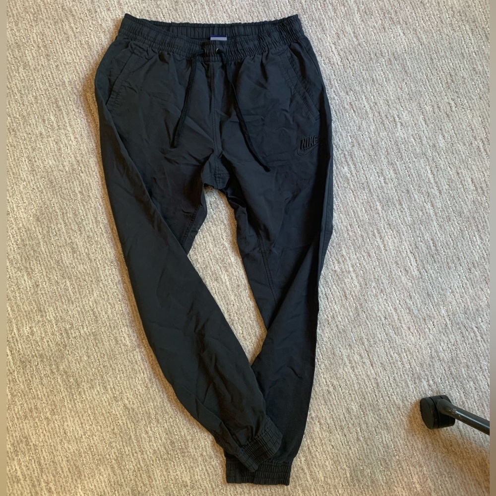 Woven Nike sportswear joggers.